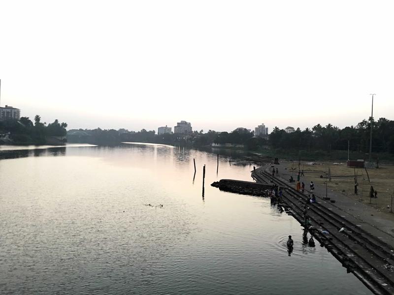 View along the water near a Hindu temple, Ernakulam, Kerala, India