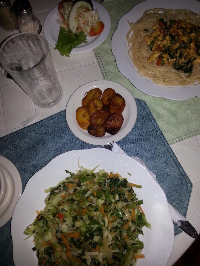 Vegetarian platter, garlic pasta and fried plantains. Pablo Restaurant, Negril, Jamaica