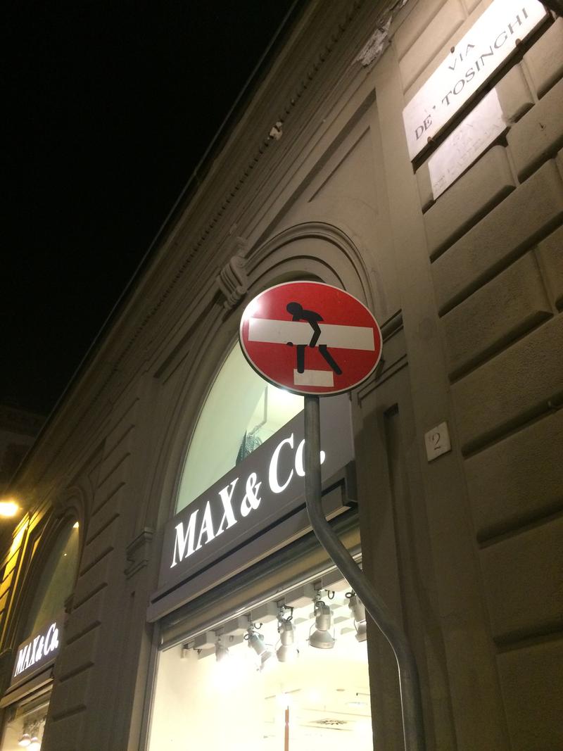 Creative street signage: carried away, Florence, Italy