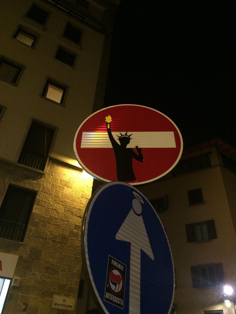 Creative street signage: lady liberty, Florence, Italy