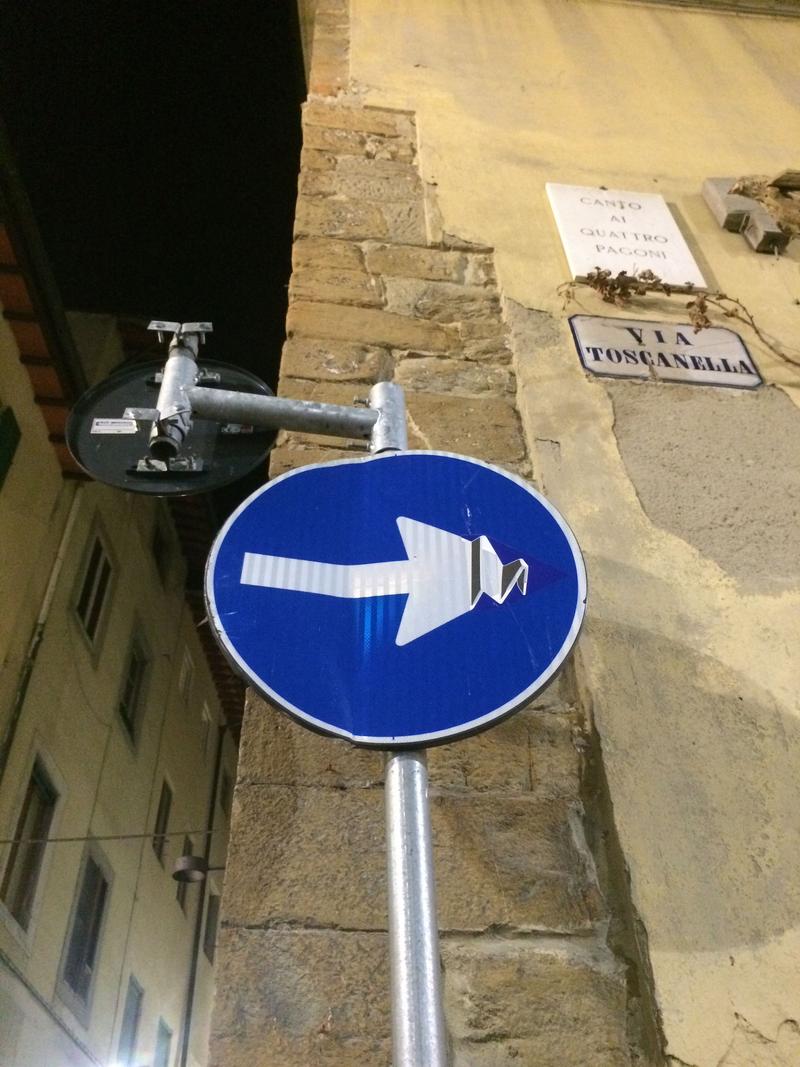 Creative street signage: folded arrow, Florence, Italy
