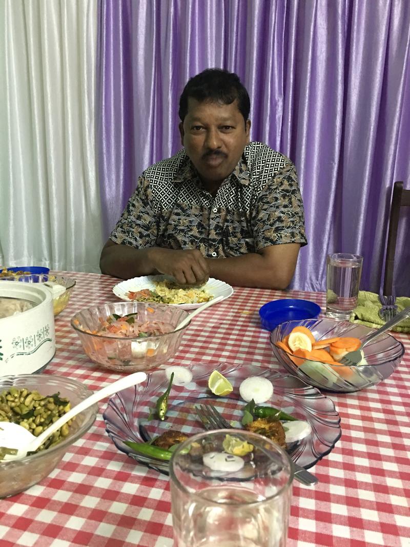 Kuttan enjoying dinner in Father Xavier's childhood home (now his brother's home), Ernakulam, Kerala, India