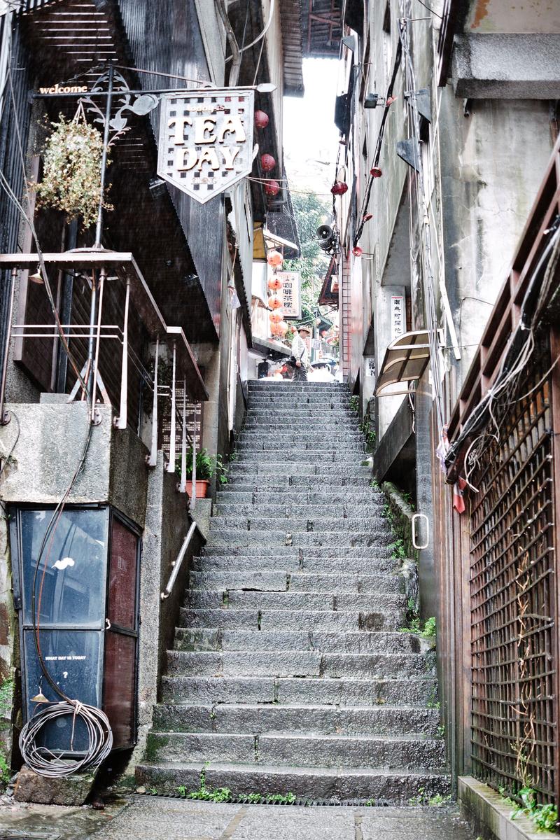 Tea Day sign and long upward staircase, Jiufen, Taiwan