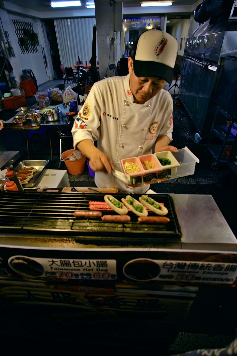 Taiwanese hot dog vendor at Liuhe Night Market, Kaosiung, Taiwan