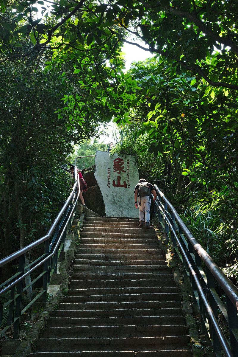 Climbing Elephant mountain’s stairs to the next viewing platform
