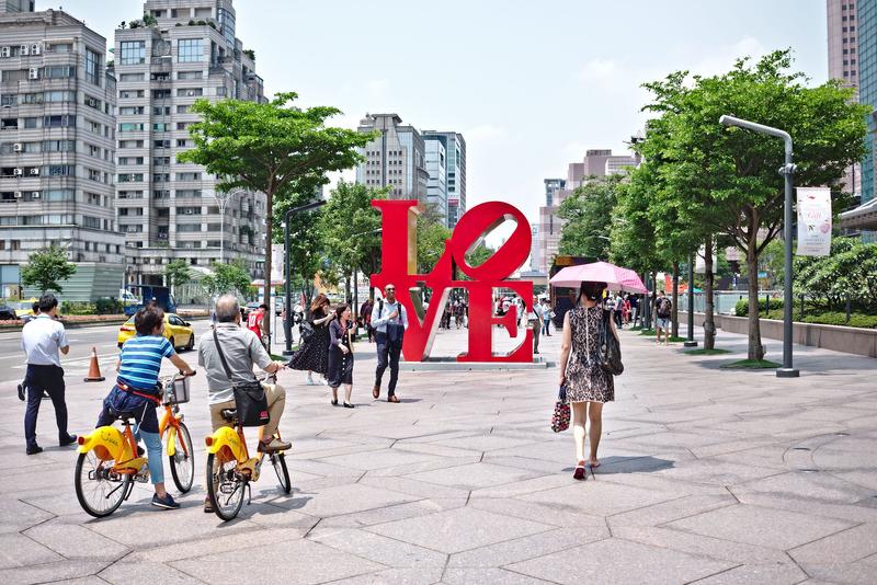Love artwork signage on the street in front of Taipei 101.