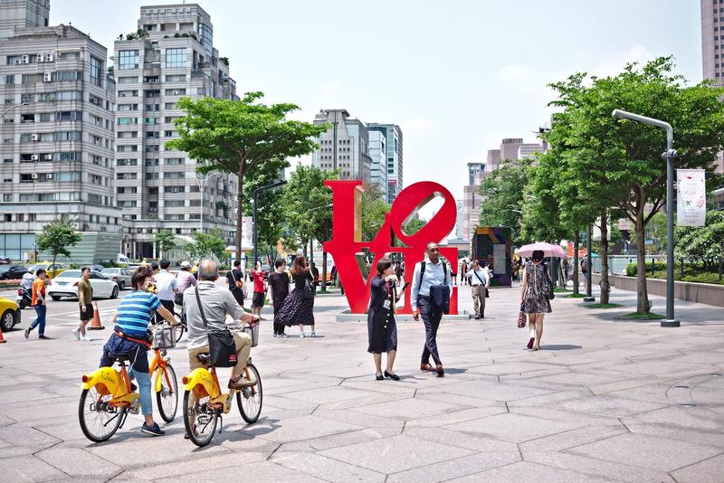Love artwork signage on the street in front of Taipei 101.