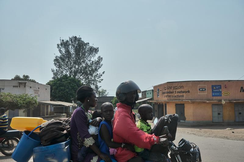 A family of five on a motorcycle, Uganda